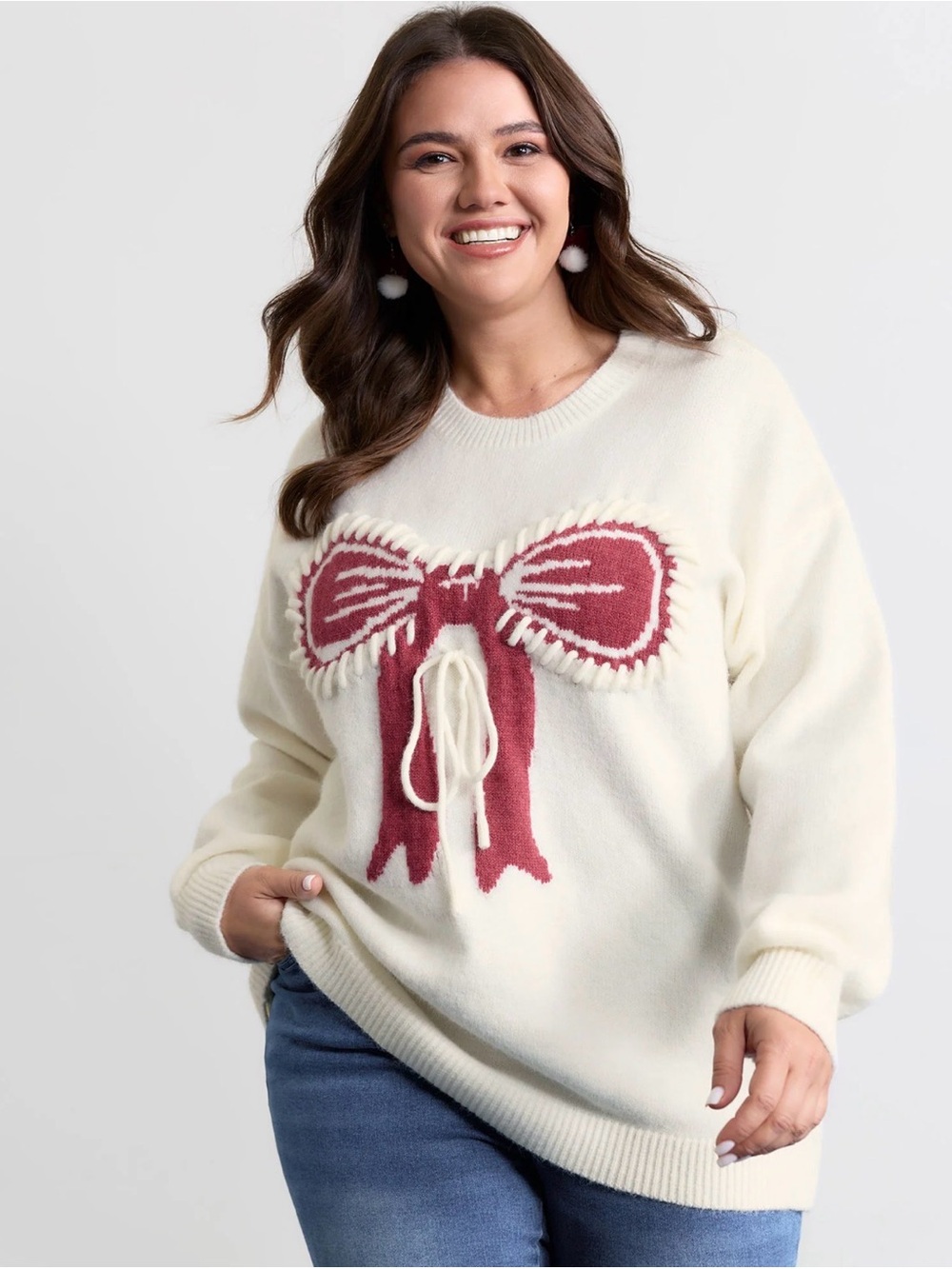 BloomChic Cream Sweater with Pink Bow Detail